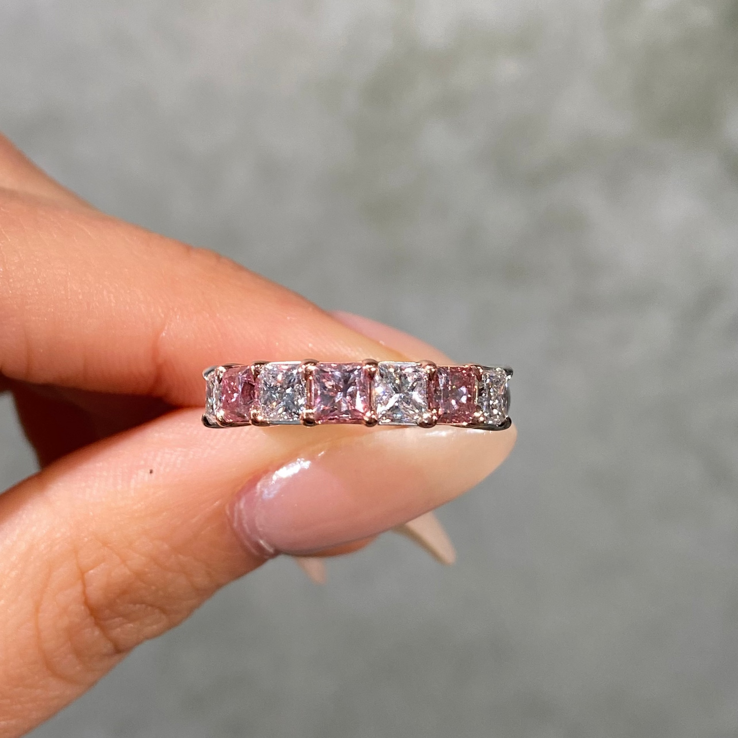 Alternating Fancy Pink and Colorless Diamond Half Eternity Band