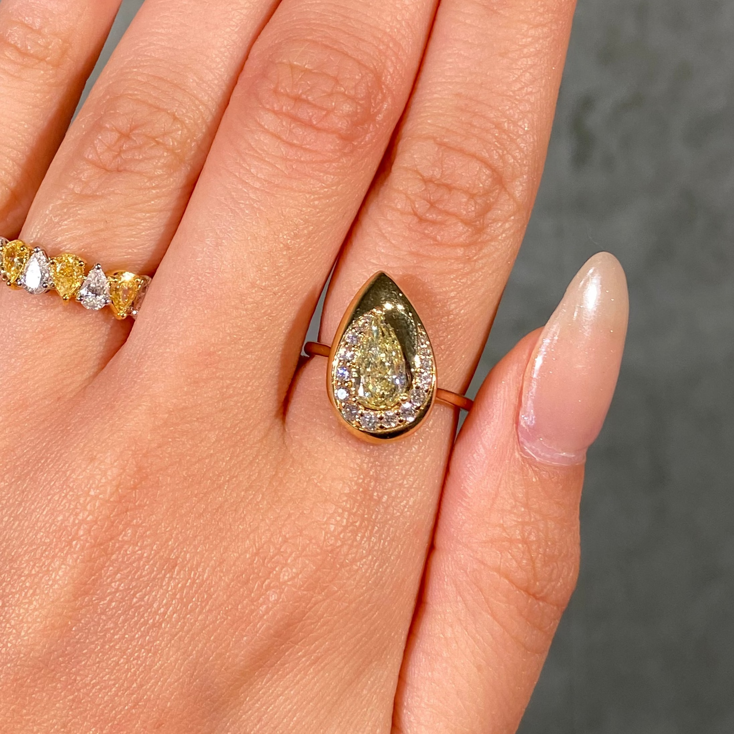 GIA Yellow Pear Diamond Bezel Swirl Pavé Ring