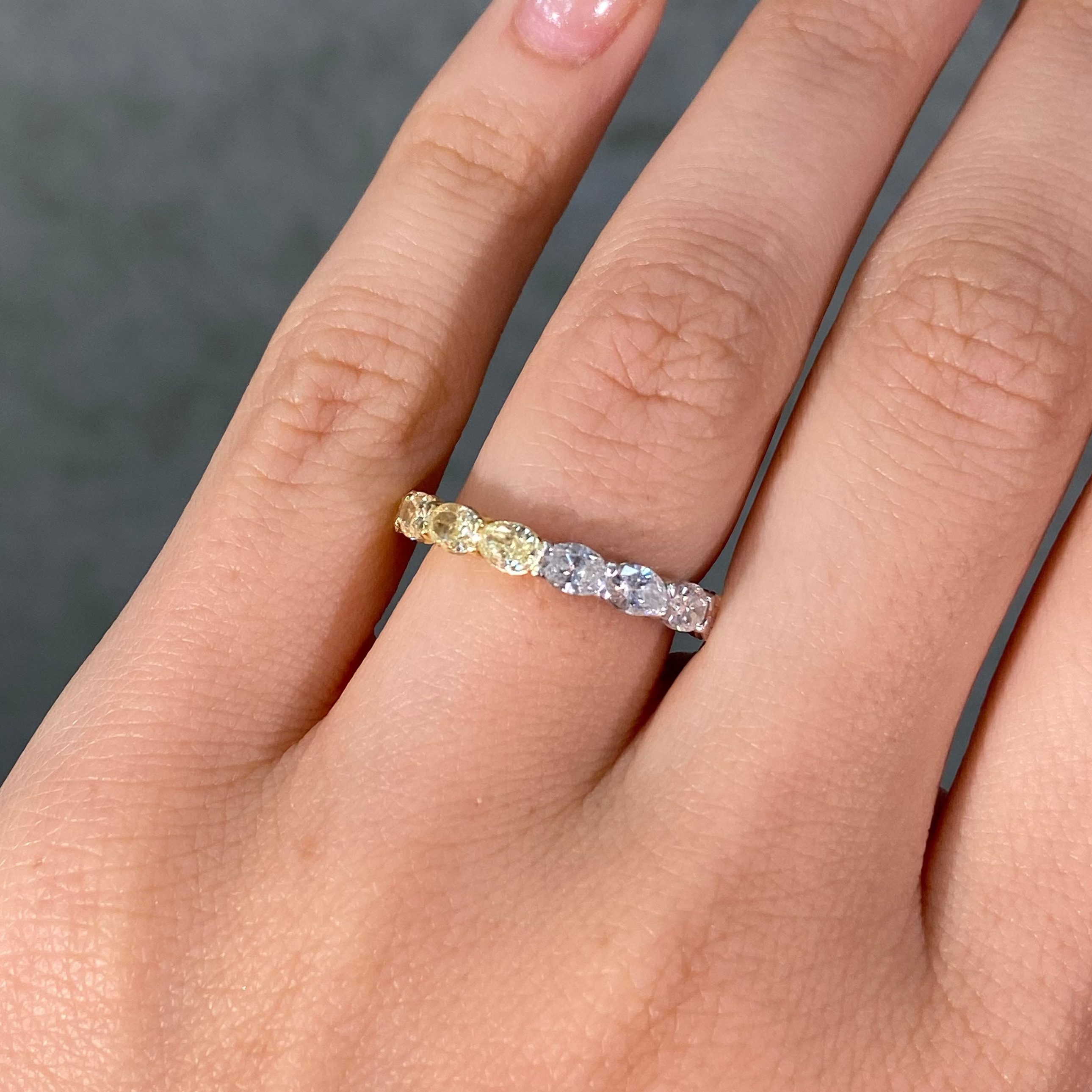Half Yellow and White Oval Diamond East-West Eternity Ring