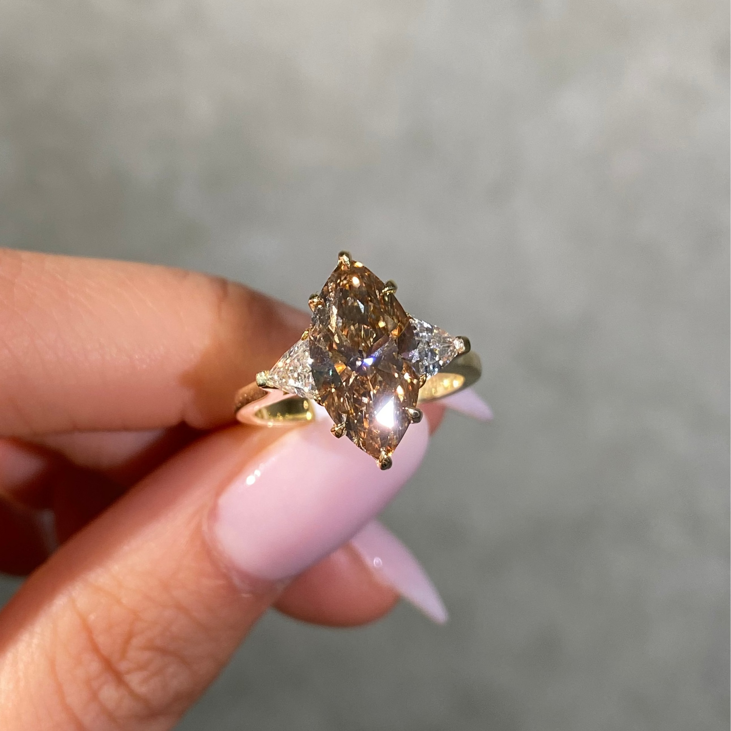 3ct Champagne Marquise diamond three stone engagement ring, handcrafted by Rare Colors by Namdar