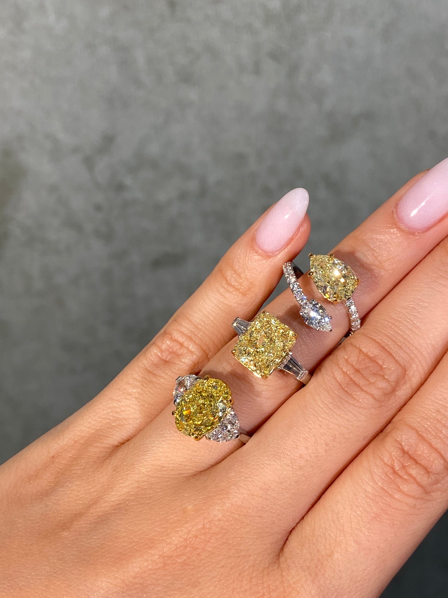5 Carat Fancy Intense Yellow Oval Diamond Three Stone Engagement Ring