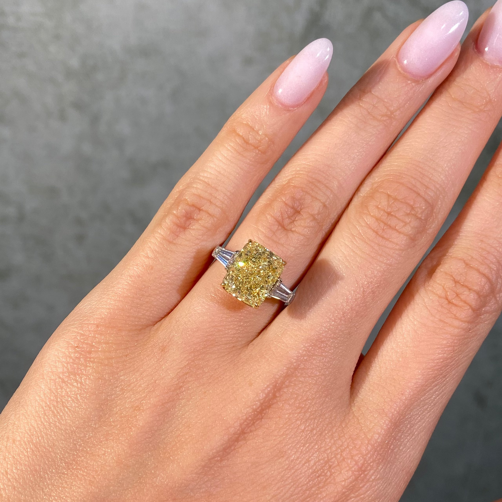 5.52ct Fancy Yellow Elongated Radiant ring — color diamond specialists Rare Colors by Namdar