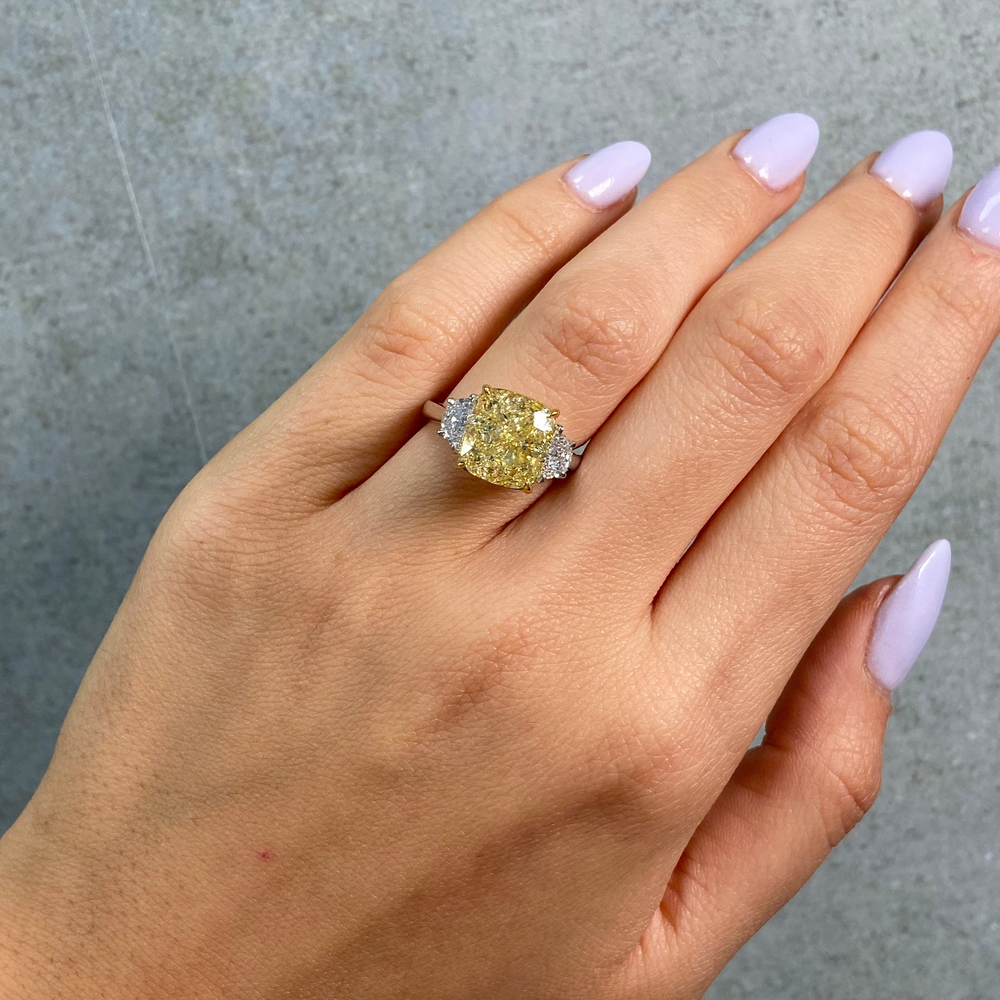 Rare Colors by Namdar 6.02ct Fancy Yellow Cushion diamond three stone engagement ring, New York City