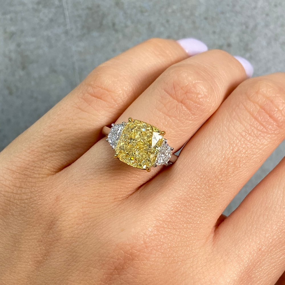 6.02ct Fancy Yellow Cushion diamond three stone engagement ring by Rare Colors by Namdar, New York City