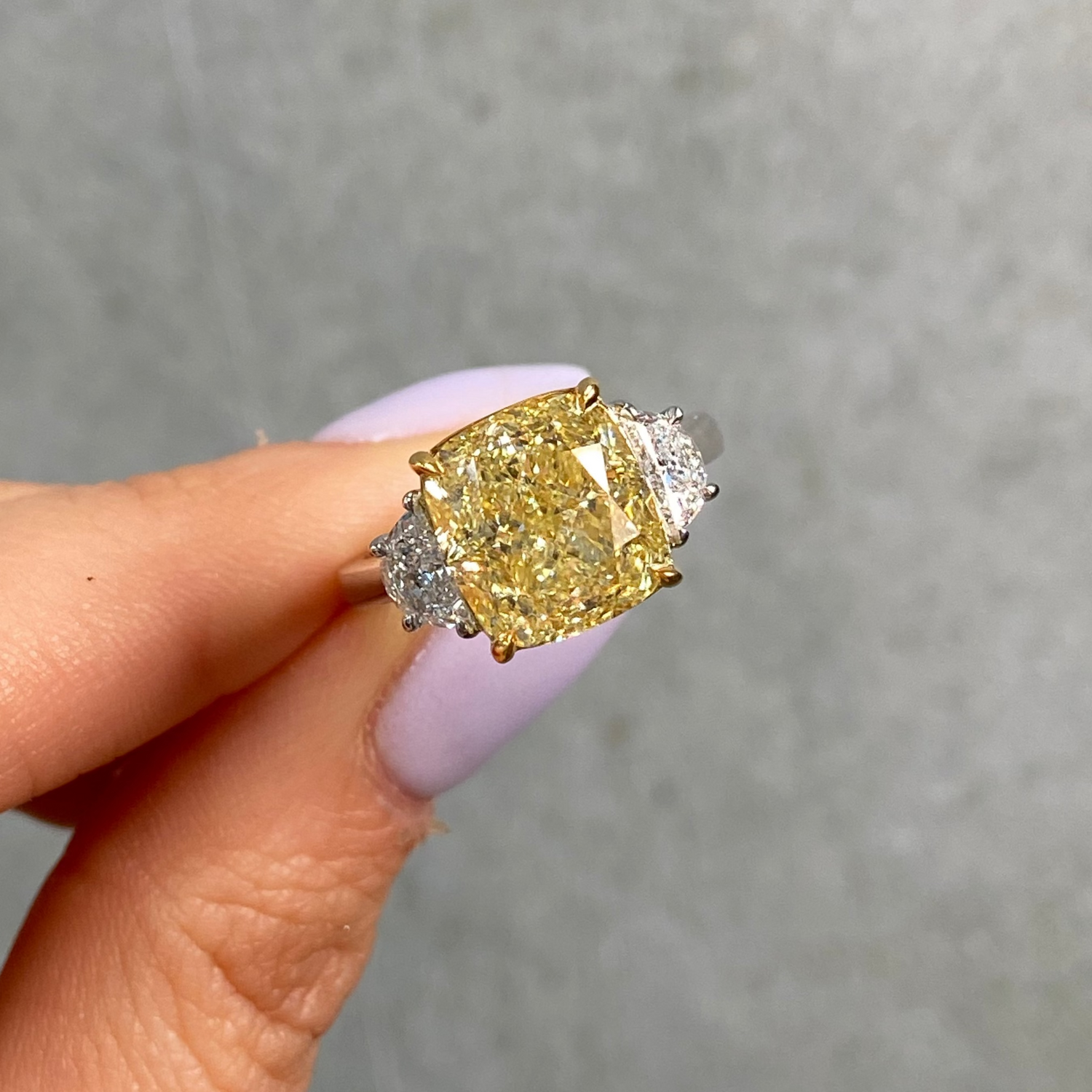 Natural 6.02ct Fancy Yellow Cushion diamond three stone engagement ring — Rare Colors by Namdar NYC