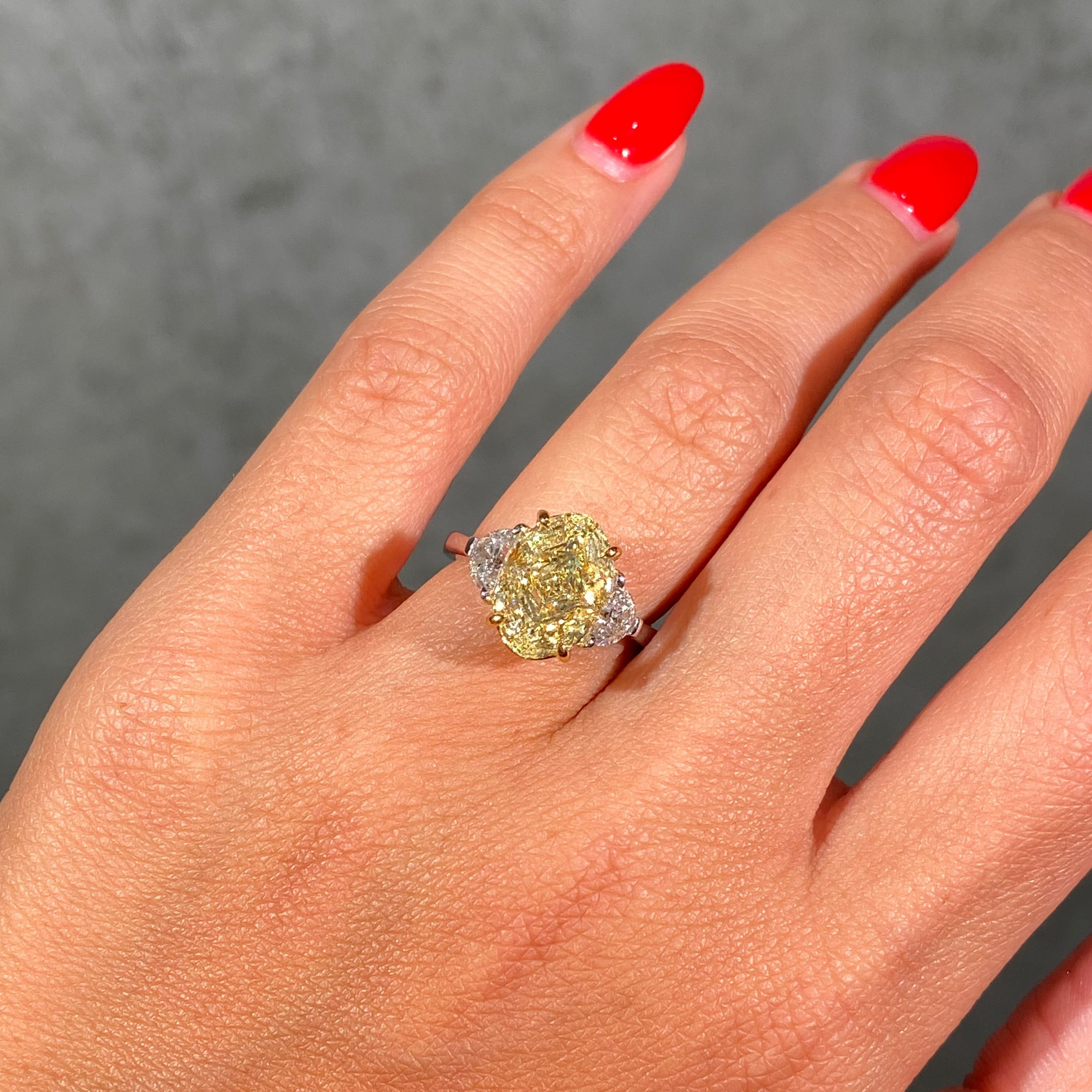 4.3ct Light Yellow Oval diamond three stone engagement ring by Rare Colors by Namdar, New York City