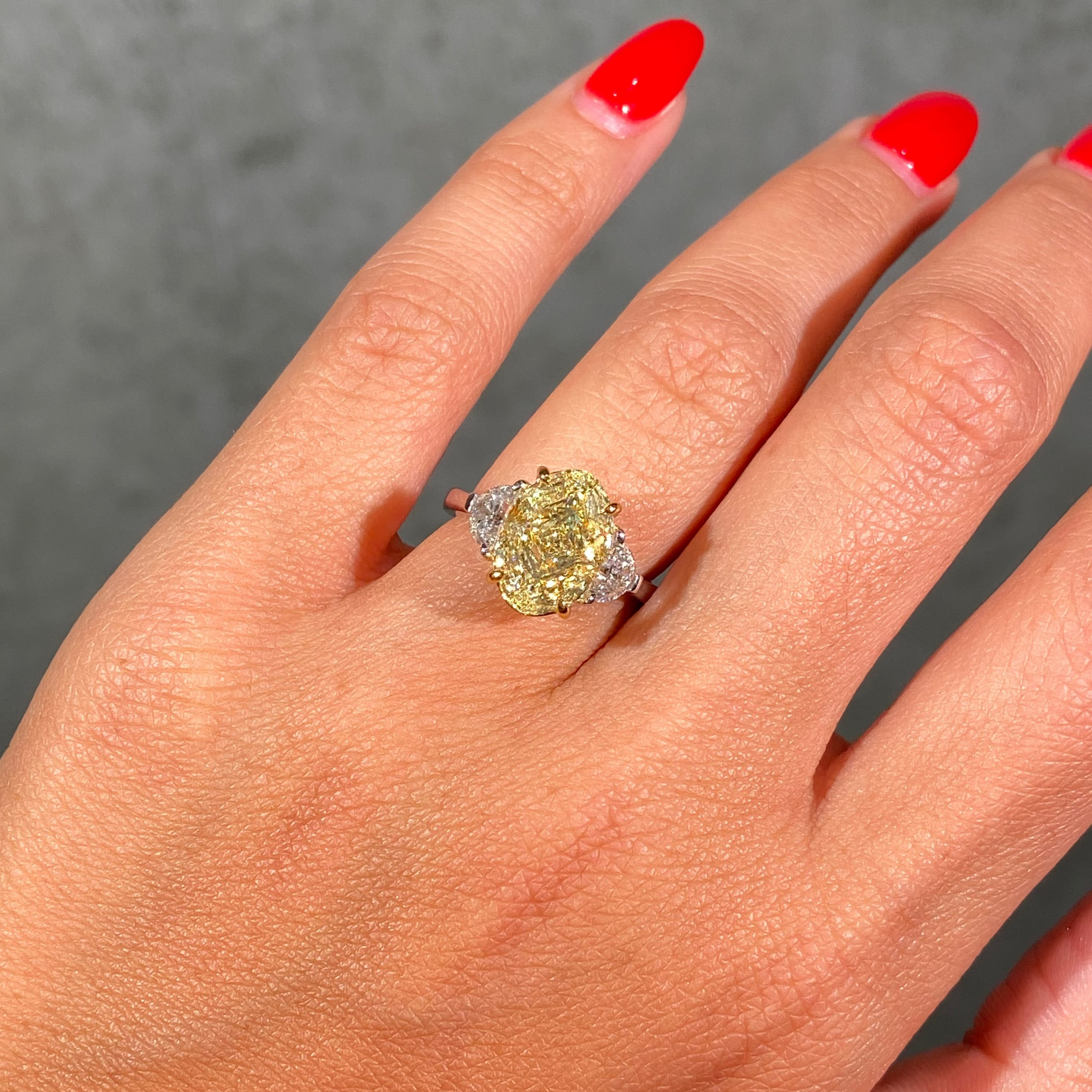 4.3ct Light Yellow Oval Diamond Three Stone Engagement Ring