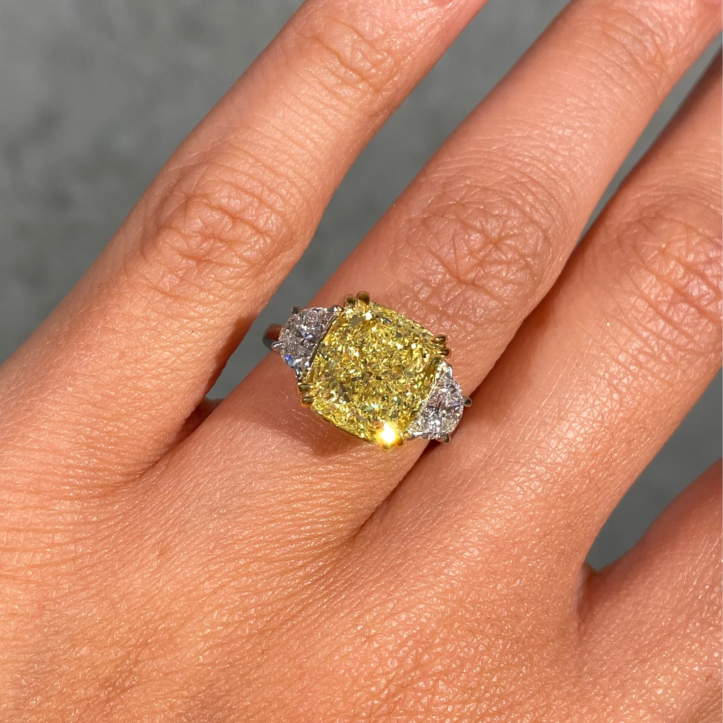 7ct Yellow Cushion diamond three stone engagement ring by Rare Colors by Namdar, New York City