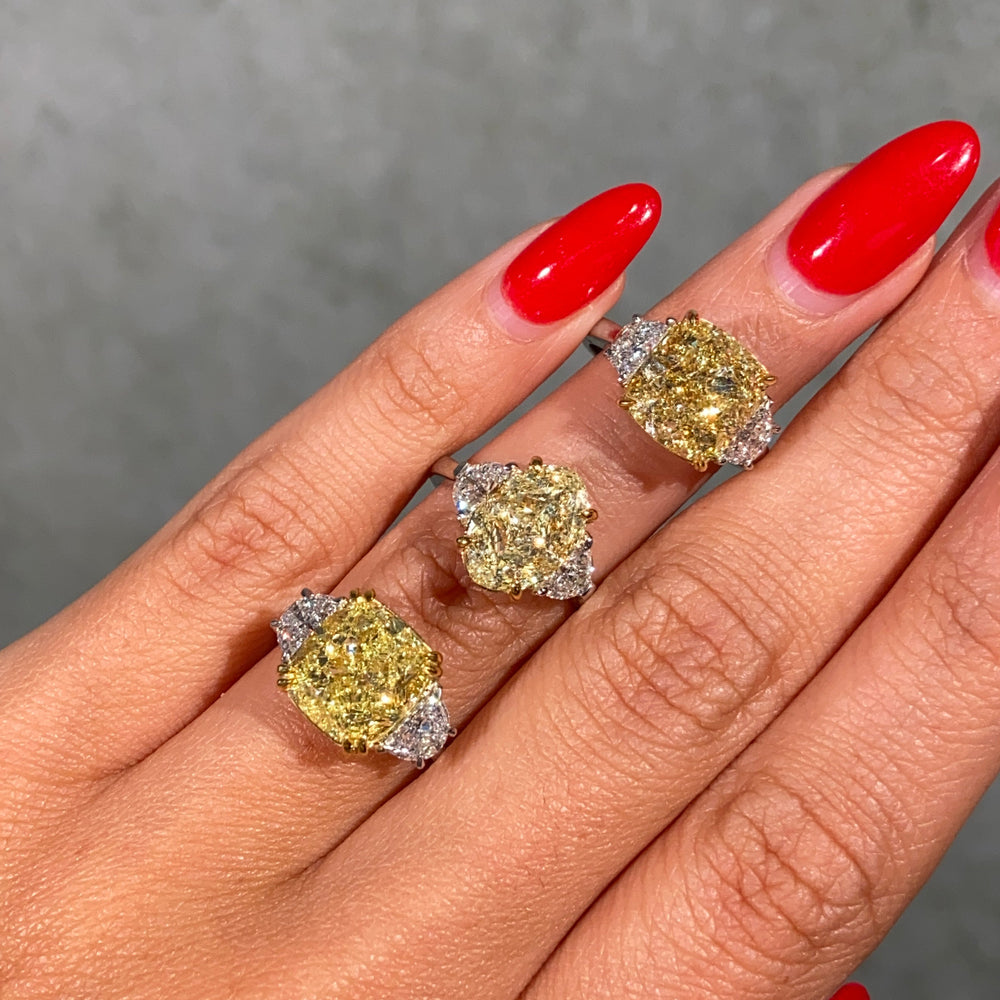 7ct GIA fancy yellow cushion diamond three stone engagement ring with half moon sides - alternate angle | Rare Colors by Namdar, NYC