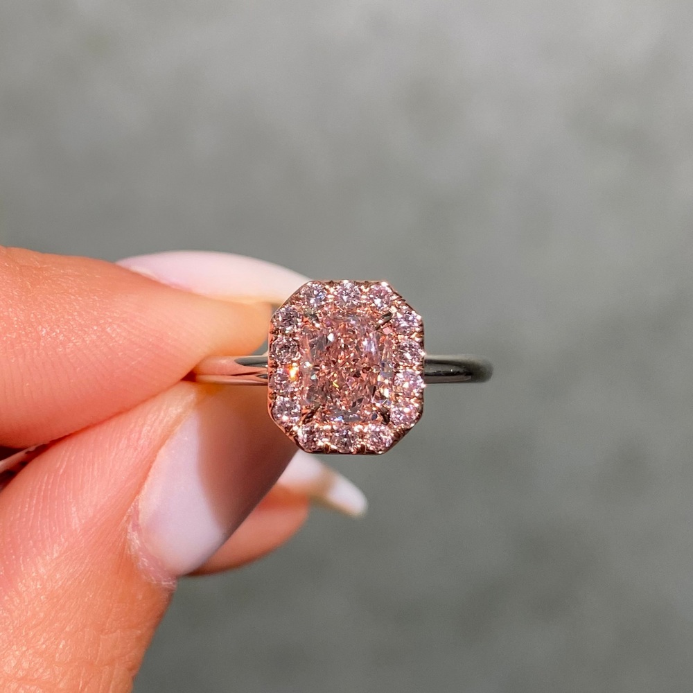1ct GIA fancy brownish pink elongated radiant diamond halo engagement ring with pink rounds - close-up detail | Rare Colors by Namdar, NYC