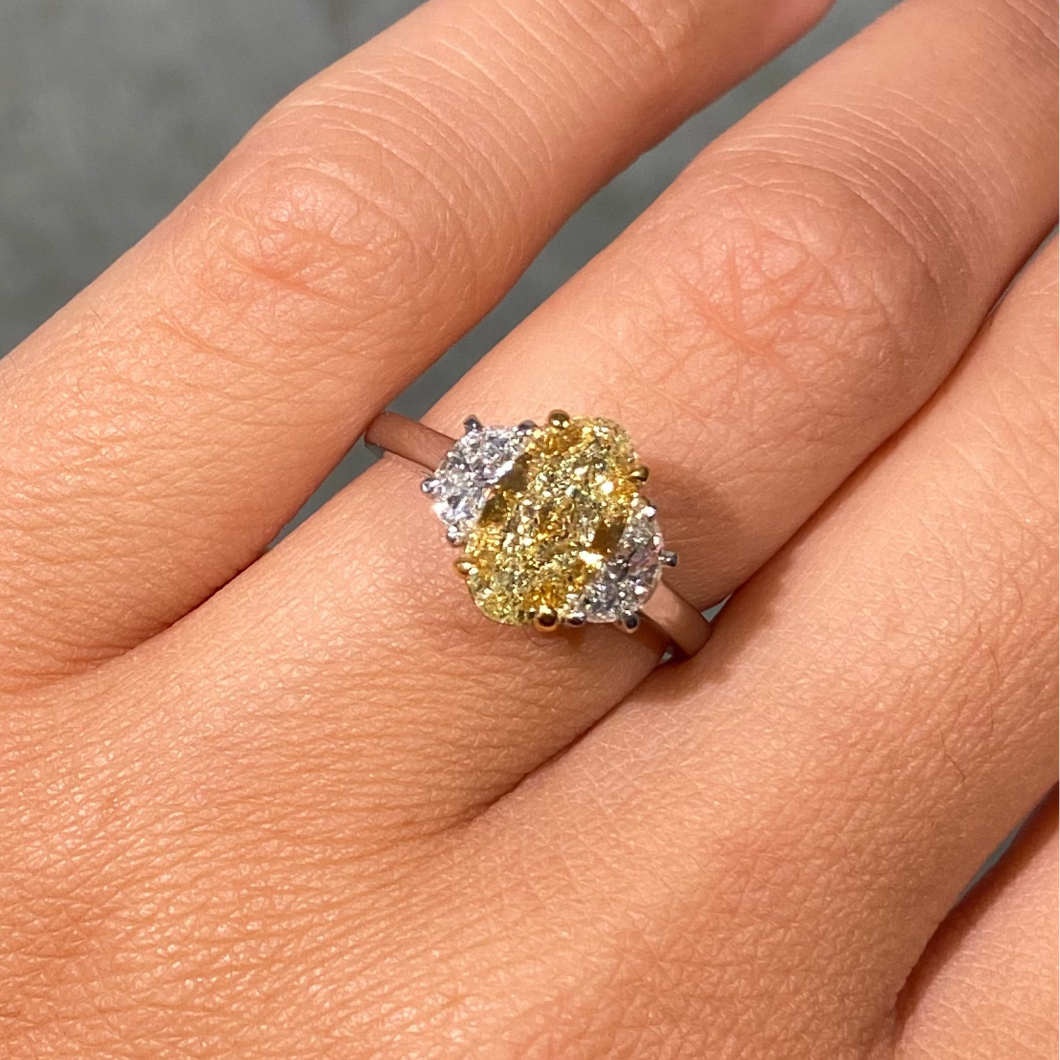 2.02ct GIA light yellow oval diamond three stone engagement ring with half moon sides - alternate angle | Rare Colors by Namdar, NYC