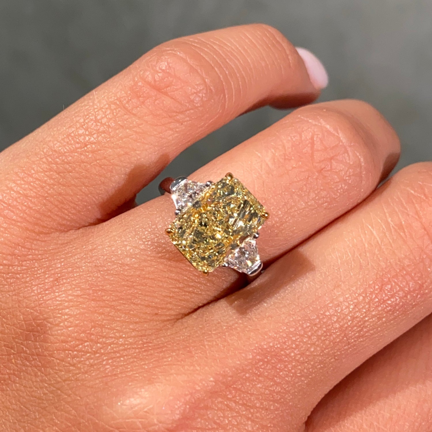 4.15ct GIA Fancy Yellow Elongated Radiant Diamond Three Stone Engagement Ring