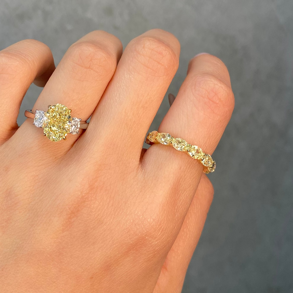 Yellow diamond oval diamond wedding band 