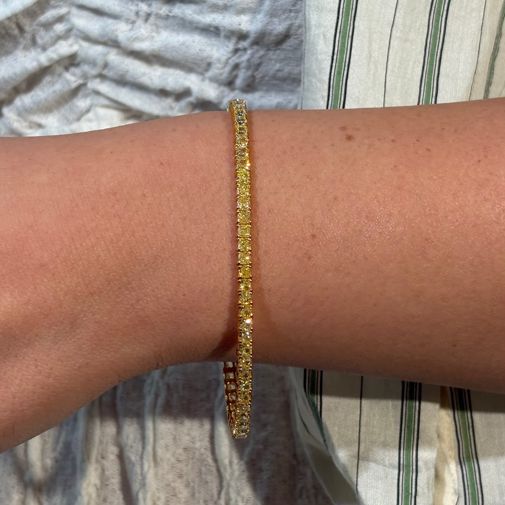 Fancy Yellow Cushion diamond tennis bracelet, handcrafted by Rare Colors by Namdar