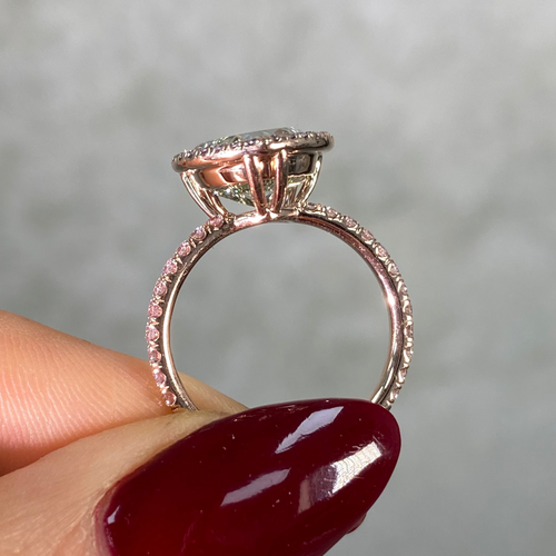Rose gold ring with a diamond ]