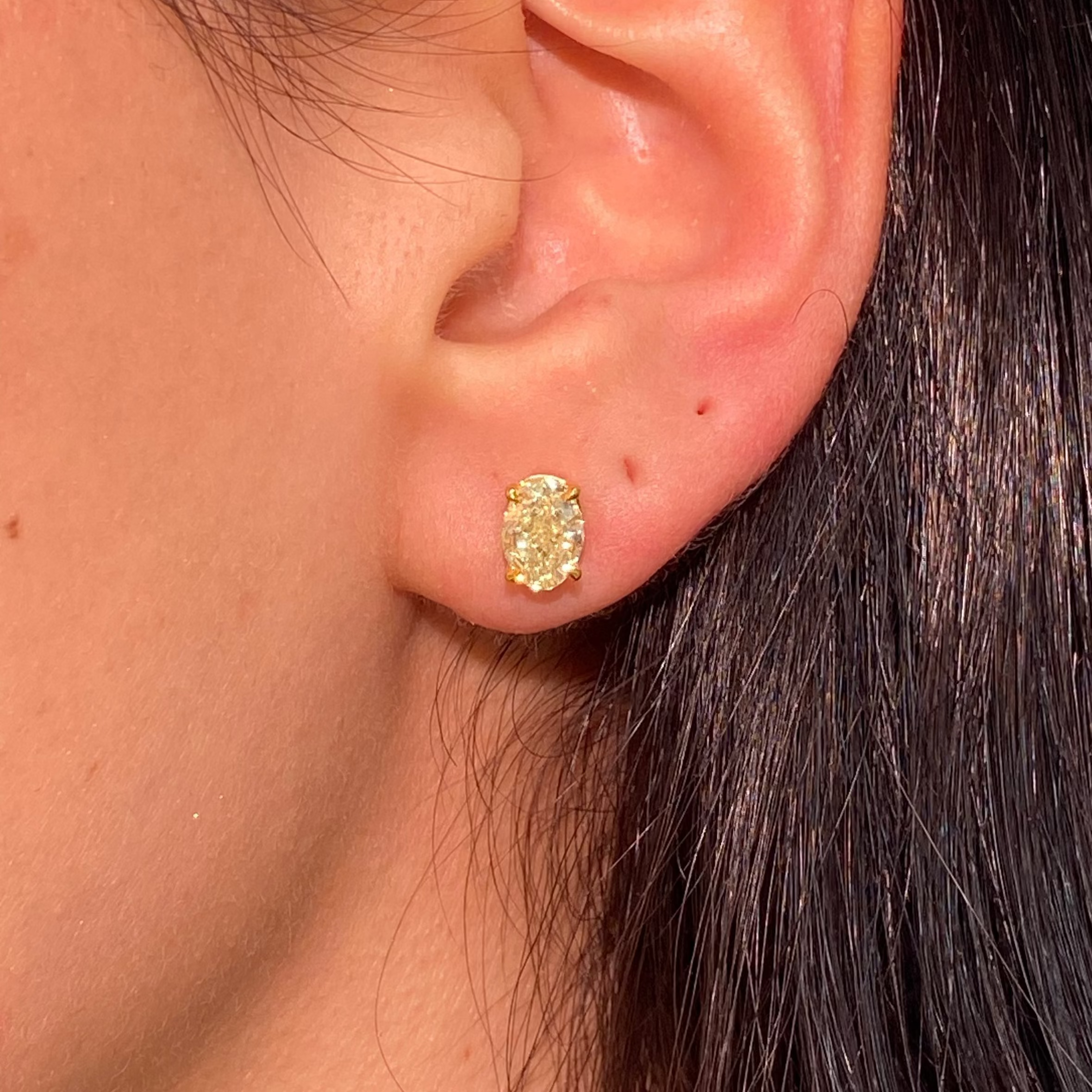 1ct Each Light Yellow Oval Diamond Studs photo on ear