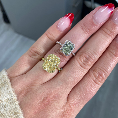 Old money yellow halo diamond engagement ring featuring a GIA certified light yellow elongated radiant diamond with VS2 clarity.