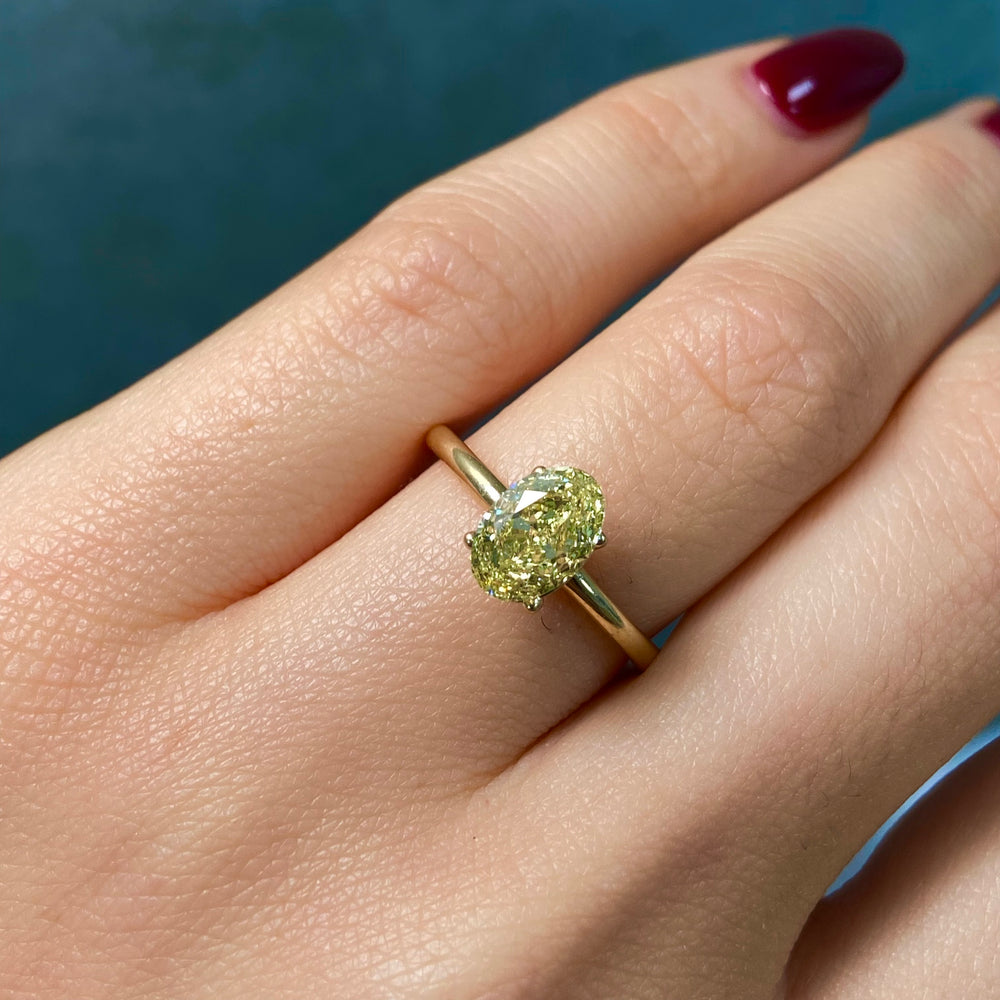 1.50ct Fancy Intense Yellow Oval loose stone — color diamond specialists Rare Colors by Namdar