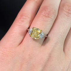 3.03 Carat Center Fancy Yellow Cushion Cut Center VS2 Clarity  0.33 Carat F Half Moons GIA Certified Diamond Crafted in Platinum and 18k Yellow Gold Handmade in NYC.