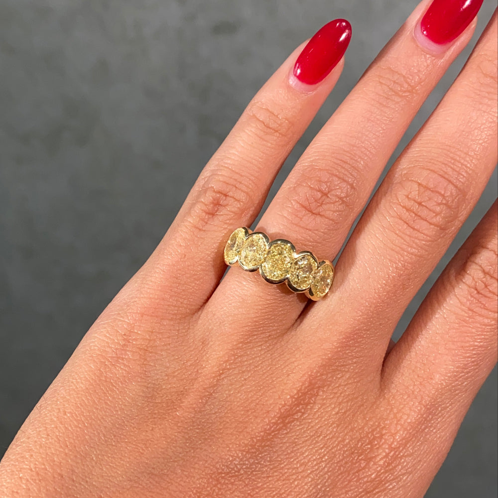5.7 Carat GIA Fancy Light Yellow Oval Diamond Bezel Half Eternity Band