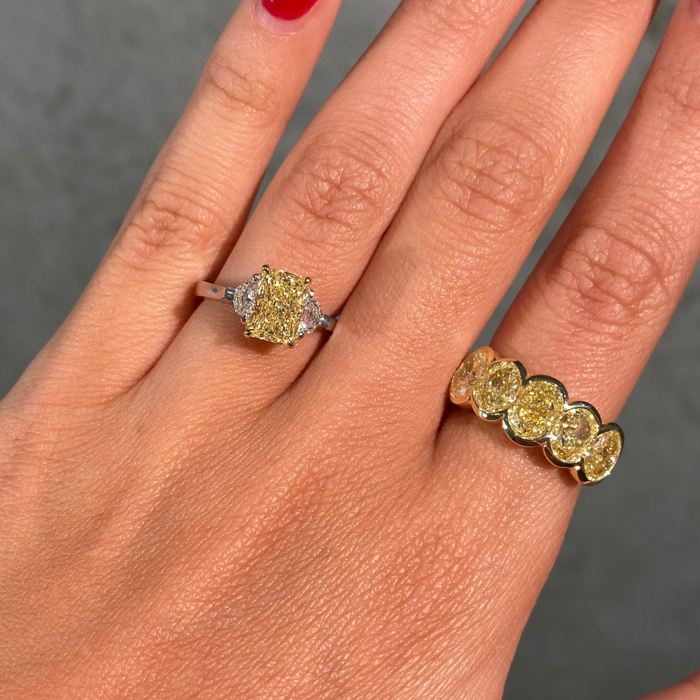 5.7 Carat GIA Fancy Light Yellow Oval Diamond Bezel Half Eternity Band