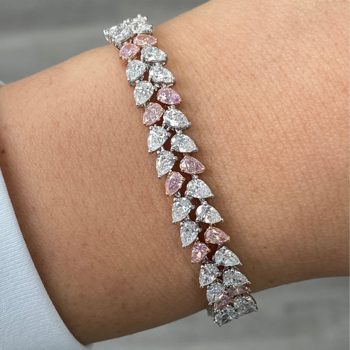 Fancy pink and white pear shape diamond double row bracelet with VS-SI clarity.
