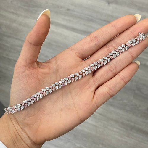 Fancy pink and white pear shape diamond double row bracelet with VS-SI clarity.