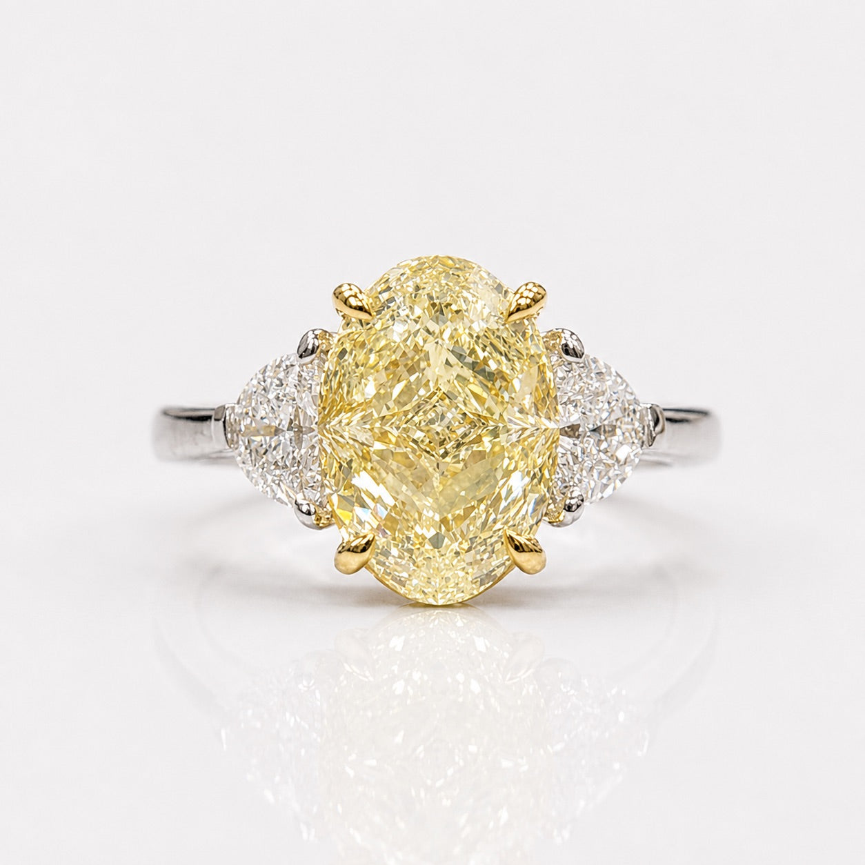 4.3ct Light Yellow Oval Diamond Three Stone Engagement Ring