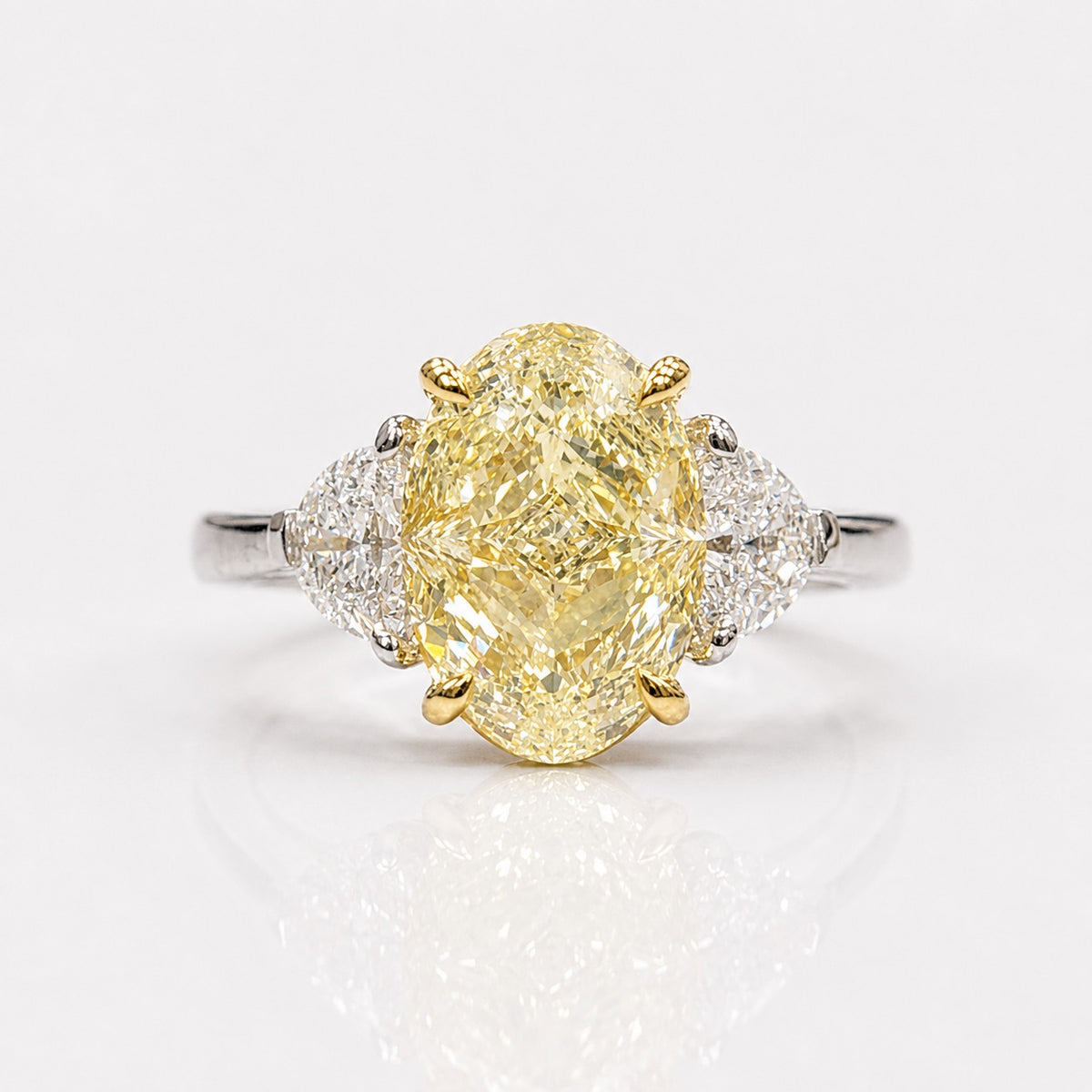 4.3ct Light Yellow Oval Diamond Three Stone Engagement Ring