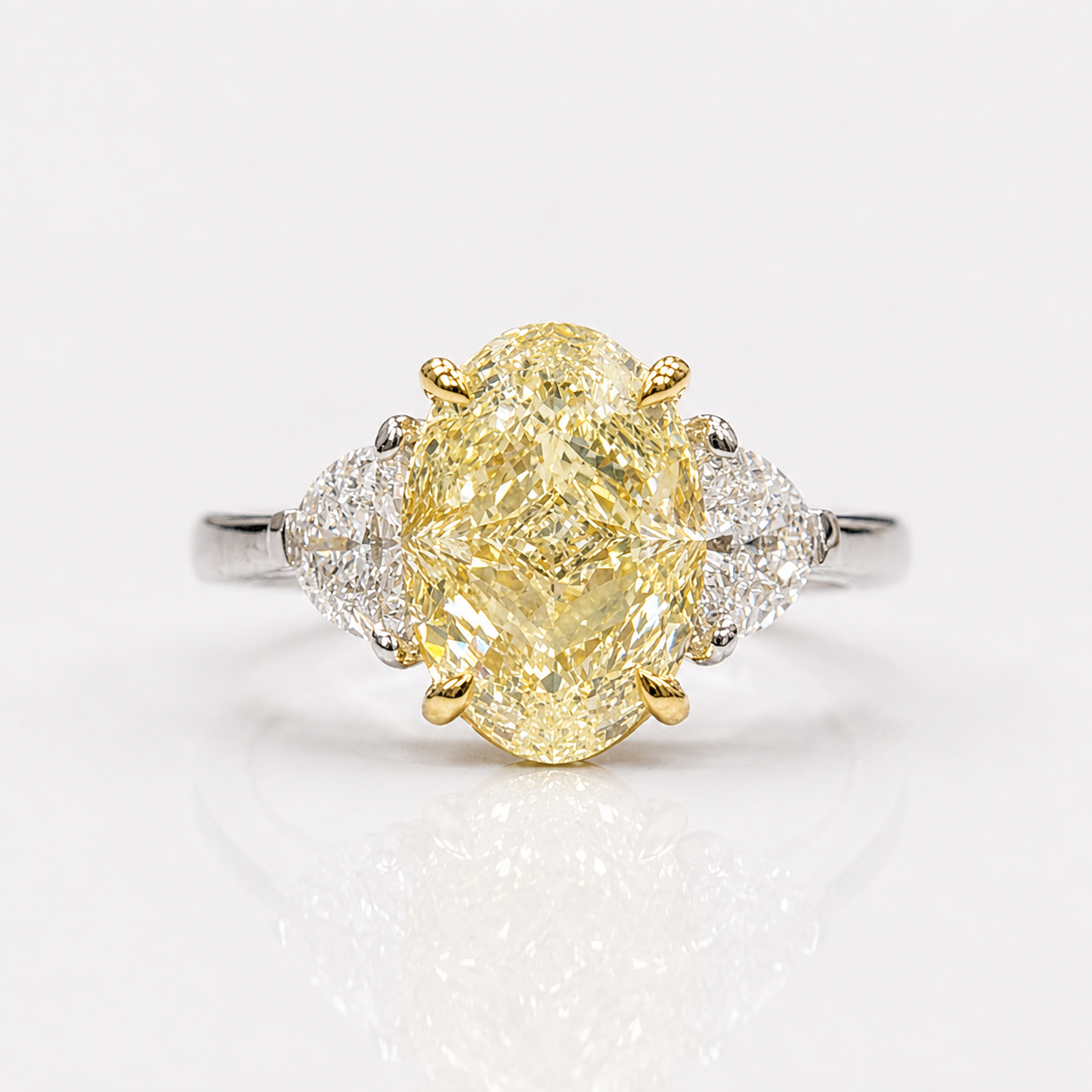 Rare Colors by Namdar 4.3ct Light Yellow Oval diamond three stone engagement ring, New York City