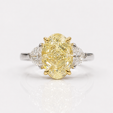 4.3ct Light Yellow Oval Diamond Three Stone Engagement Ring