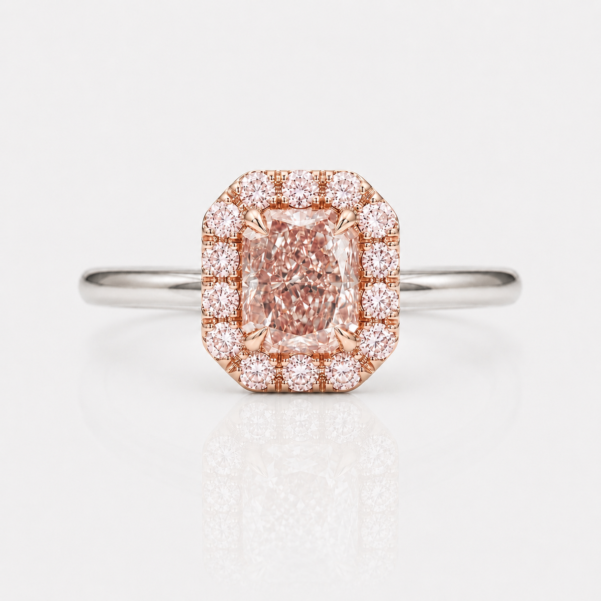 1ct GIA fancy brownish pink elongated radiant diamond halo engagement ring with pink rounds | Rare Colors by Namdar, NYC