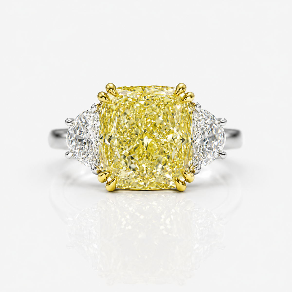 7ct GIA fancy yellow cushion diamond three stone engagement ring with half moon sides | Rare Colors by Namdar, NYC
