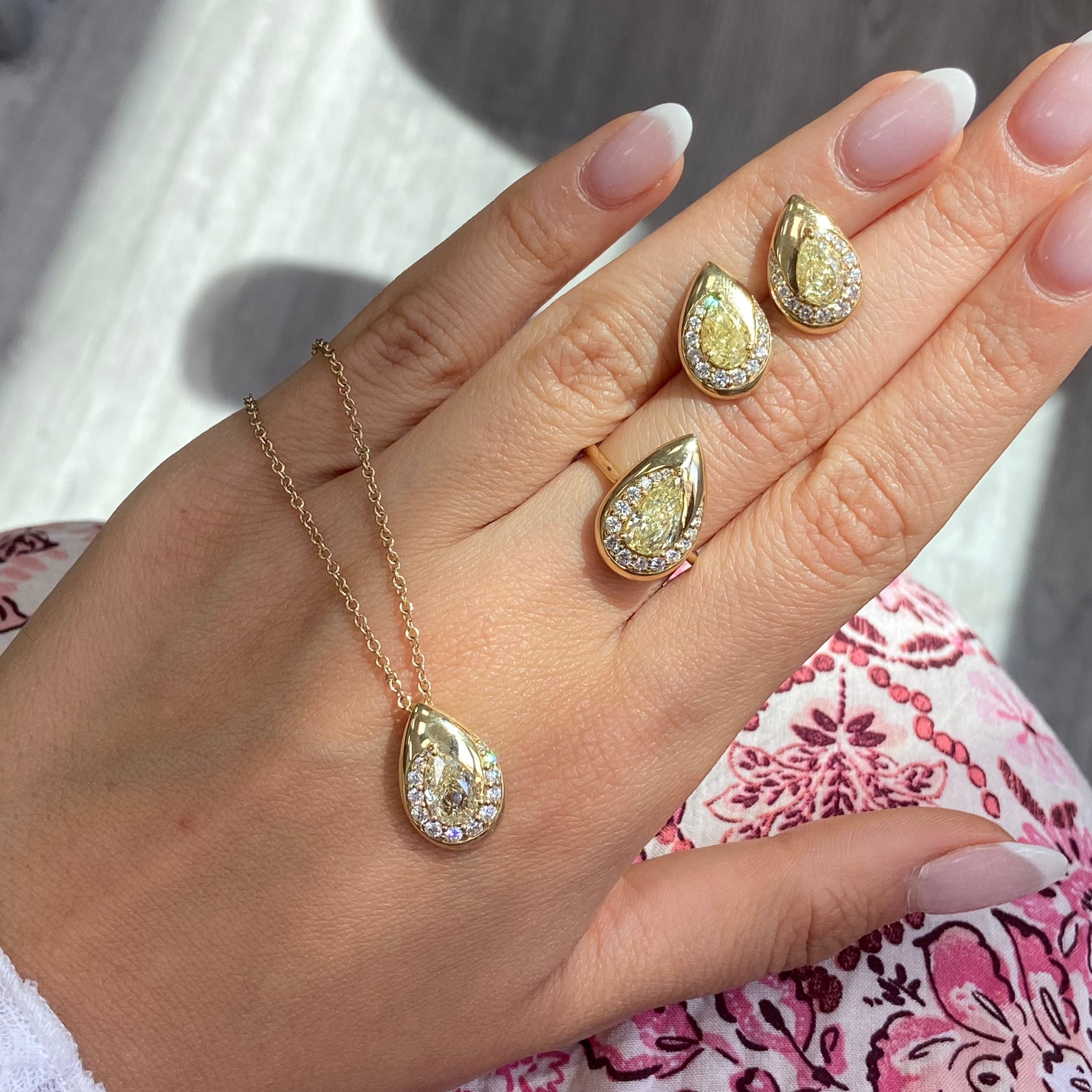 Fancy Light Yellow Pear Diamond Bezel Swirl Stud Earrings