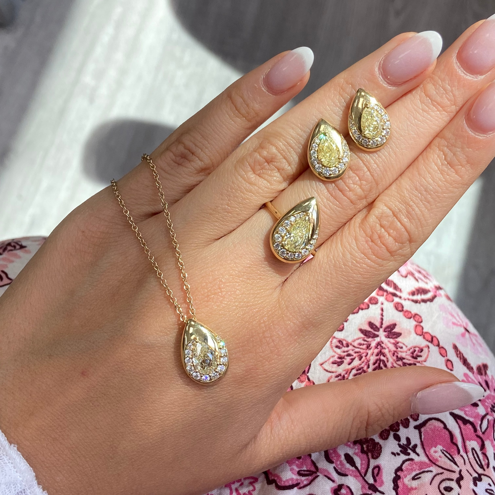 Fancy Light Yellow Pear Diamond Bezel Swirl Stud Earrings