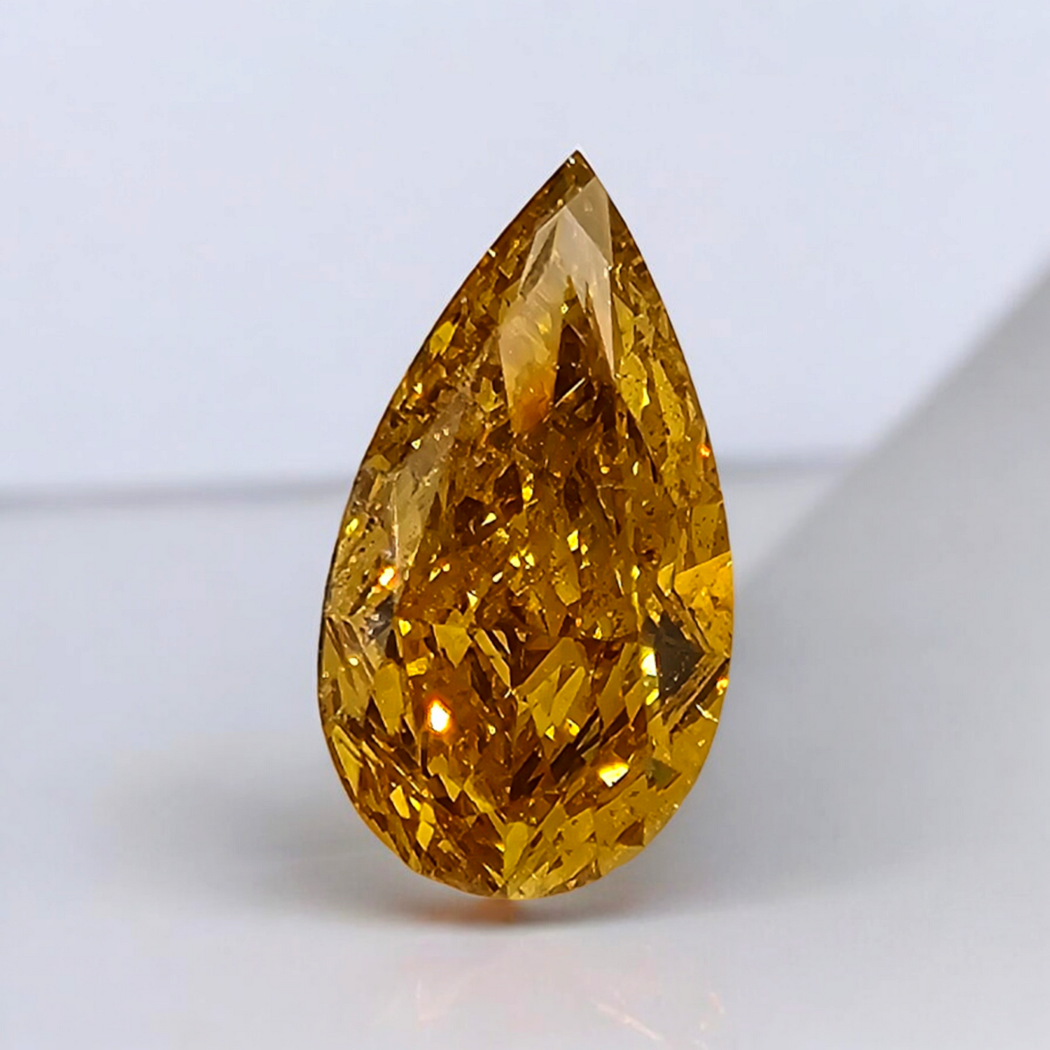 1ct Fancy Intense Orange Pear diamond fine jewelry, handcrafted by Rare Colors by Namdar