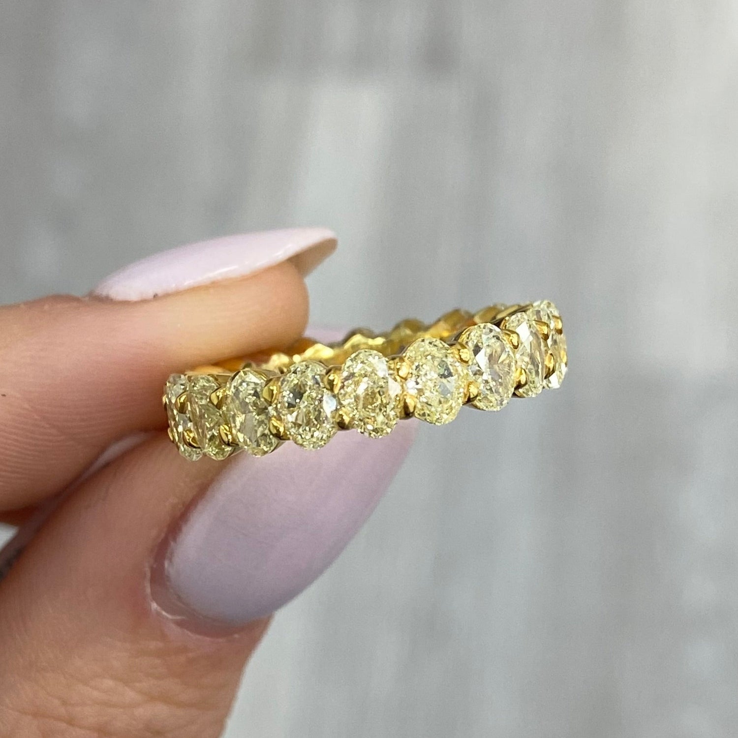 Fancy Yellow Oval eternity band — color diamond specialists Rare Colors by Namdar