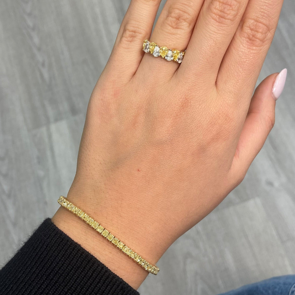 Fancy intense yellow diamond tennis bracelet with natural canary diamonds