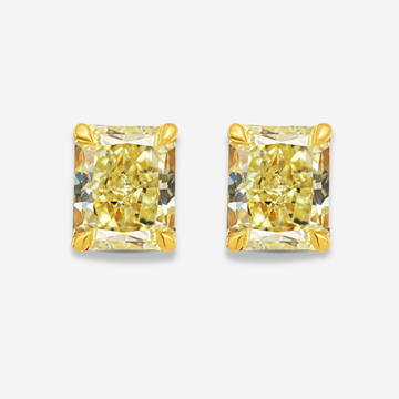 Pair of yellow diamond earrings on a light gray background