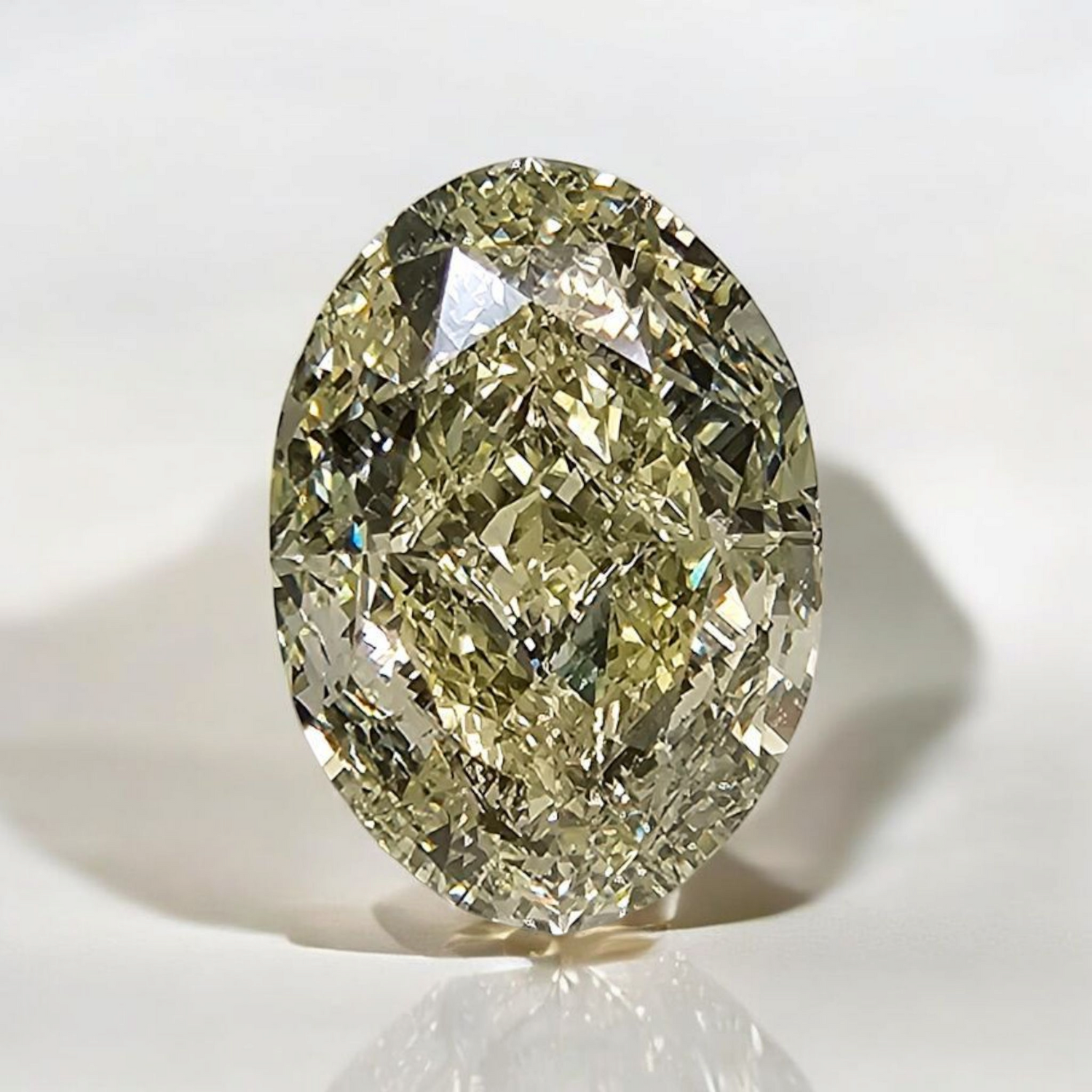 Natural 11.07ct Light Yellow Oval diamond loose stone — Rare Colors by Namdar NYC