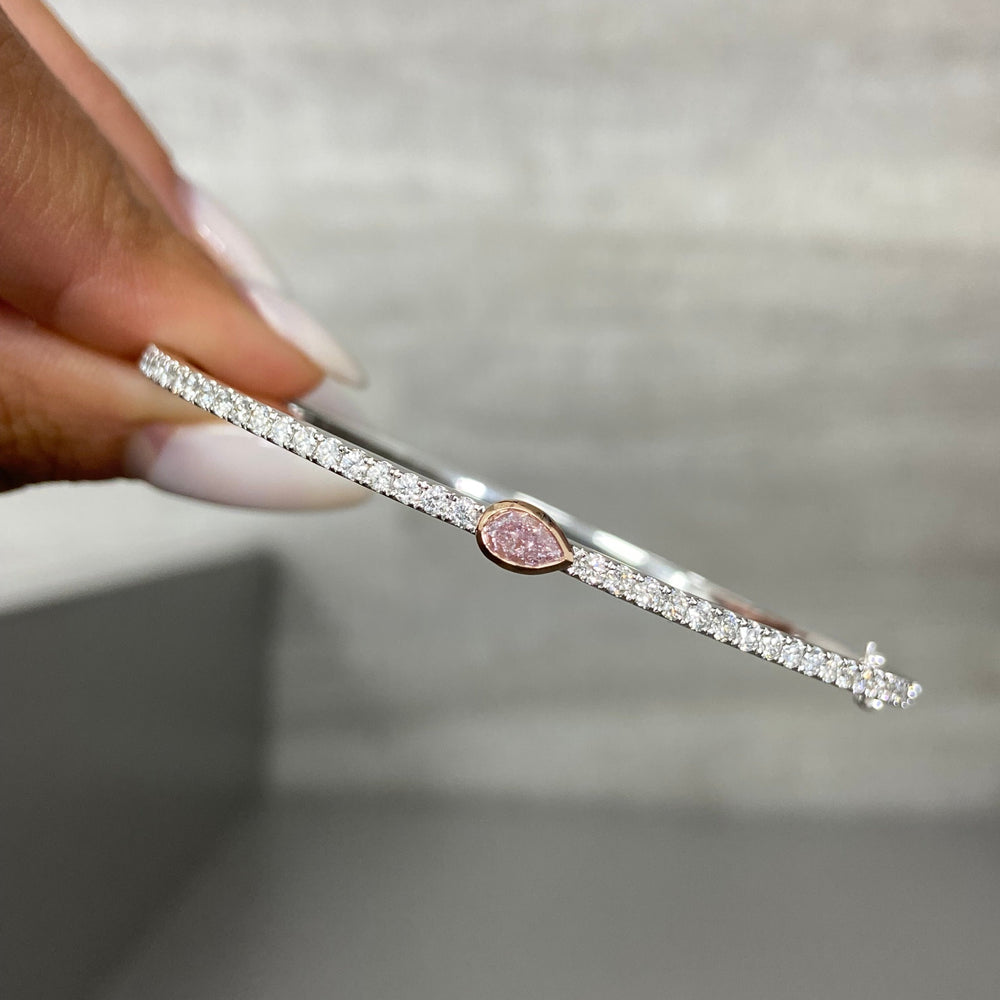 GIA certified fancy light pink bangle bracelet.