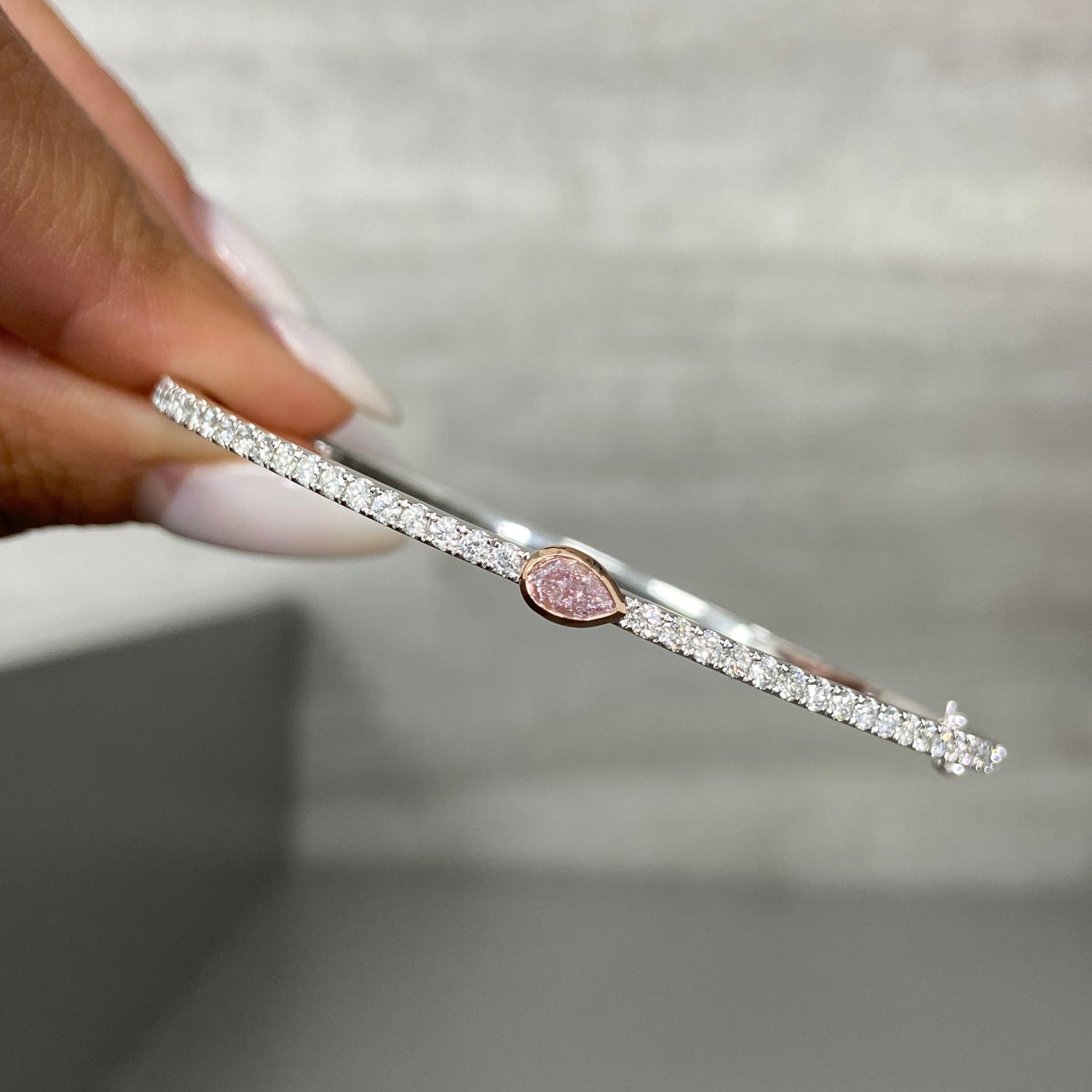 GIA certified fancy light pink bangle bracelet.