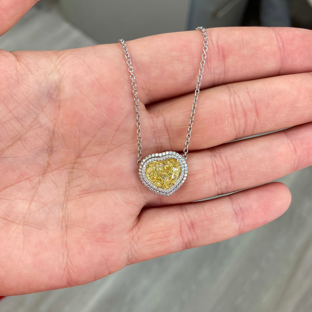 5ct Fancy Light Yellow Heart pendant — color diamond specialists Rare Colors by Namdar