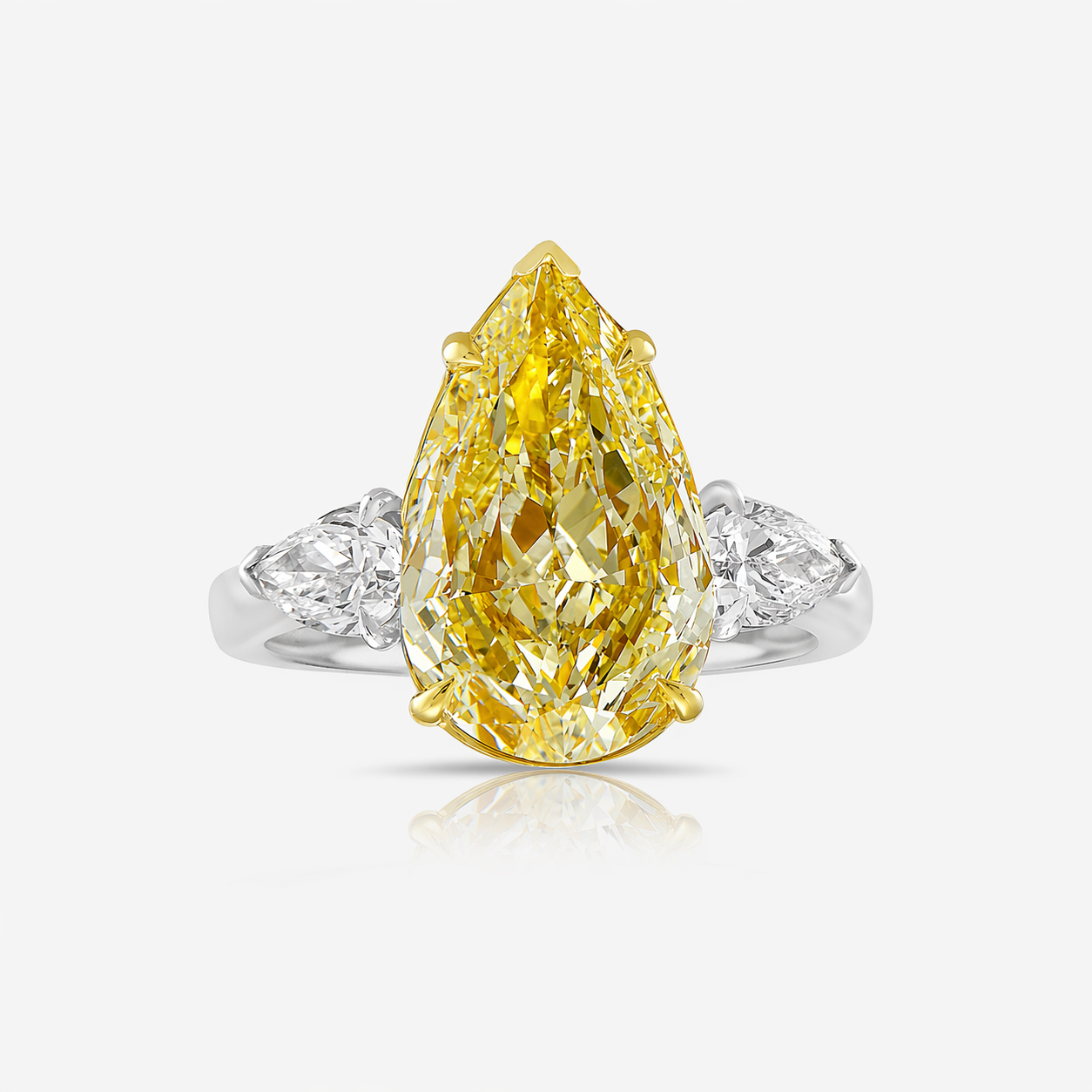 Light Yellow Pear Diamond Three Stone Engagement Ring