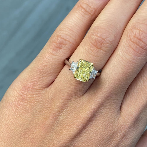 3 Carat Fancy Yellow Elongated Radiant Diamond Three Stone Ring