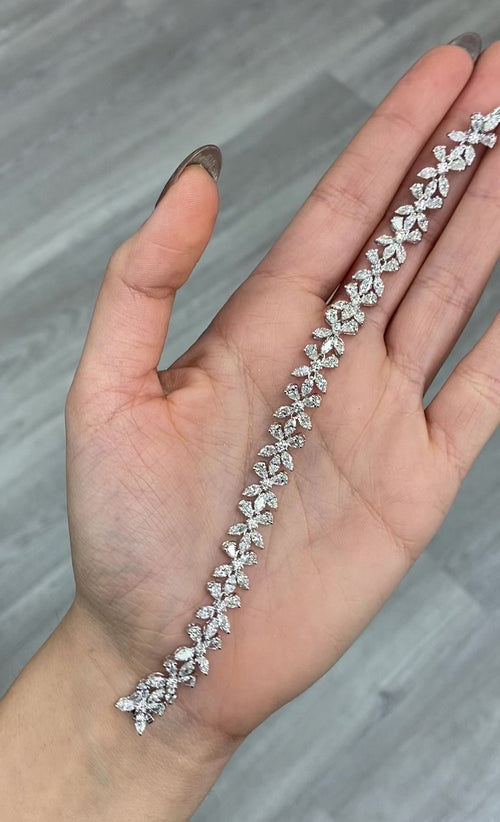Elegant white diamond bracelet. tennis bracelet. floral diamond bracelet.