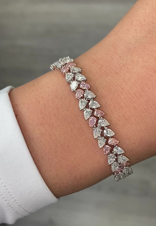 Fancy pink and white pear shape diamond double row bracelet with VS-SI clarity.