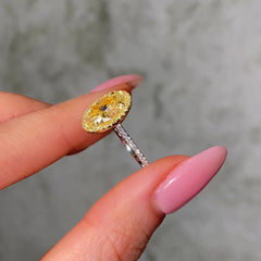 Two Tone Oval Diamond Halo Engagement Ring