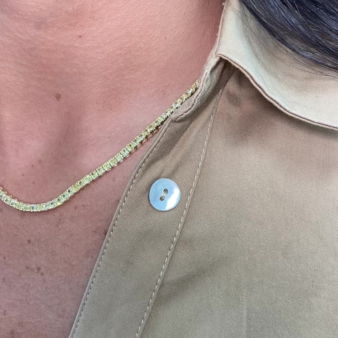 Natural intense yellow diamond tennis necklace with cushion cut diamonds set in 18k yellow gold.