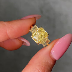 Yellow diamond ring on a female hand video